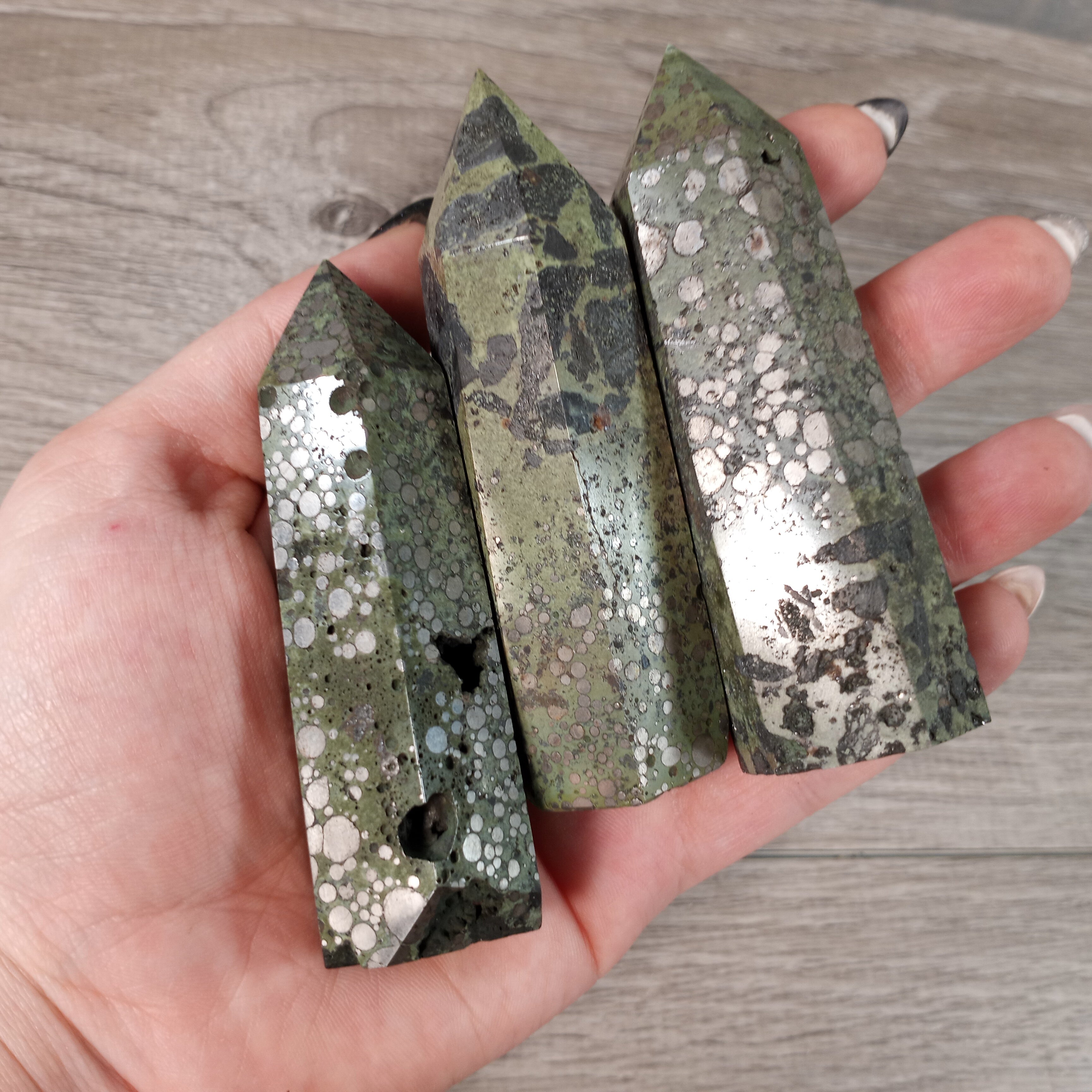 Pyrite with Green Jasper obelisks for resale.