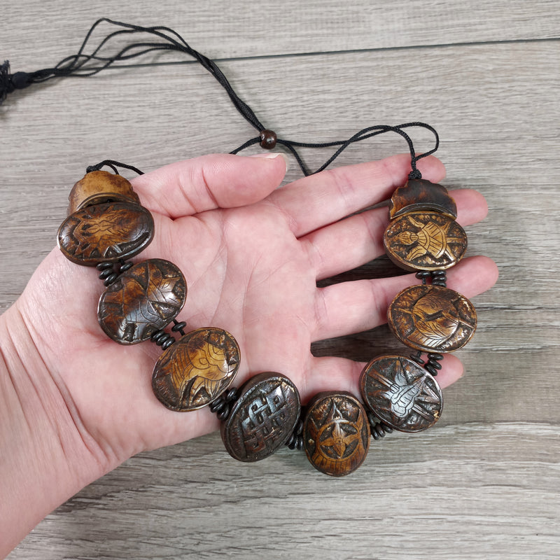 Bone Necklace Carved with the Eight Auspicious Symbols of Tibetan Buddhism