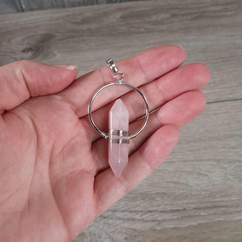 rose quartz double terminated pendant with a silver color metal