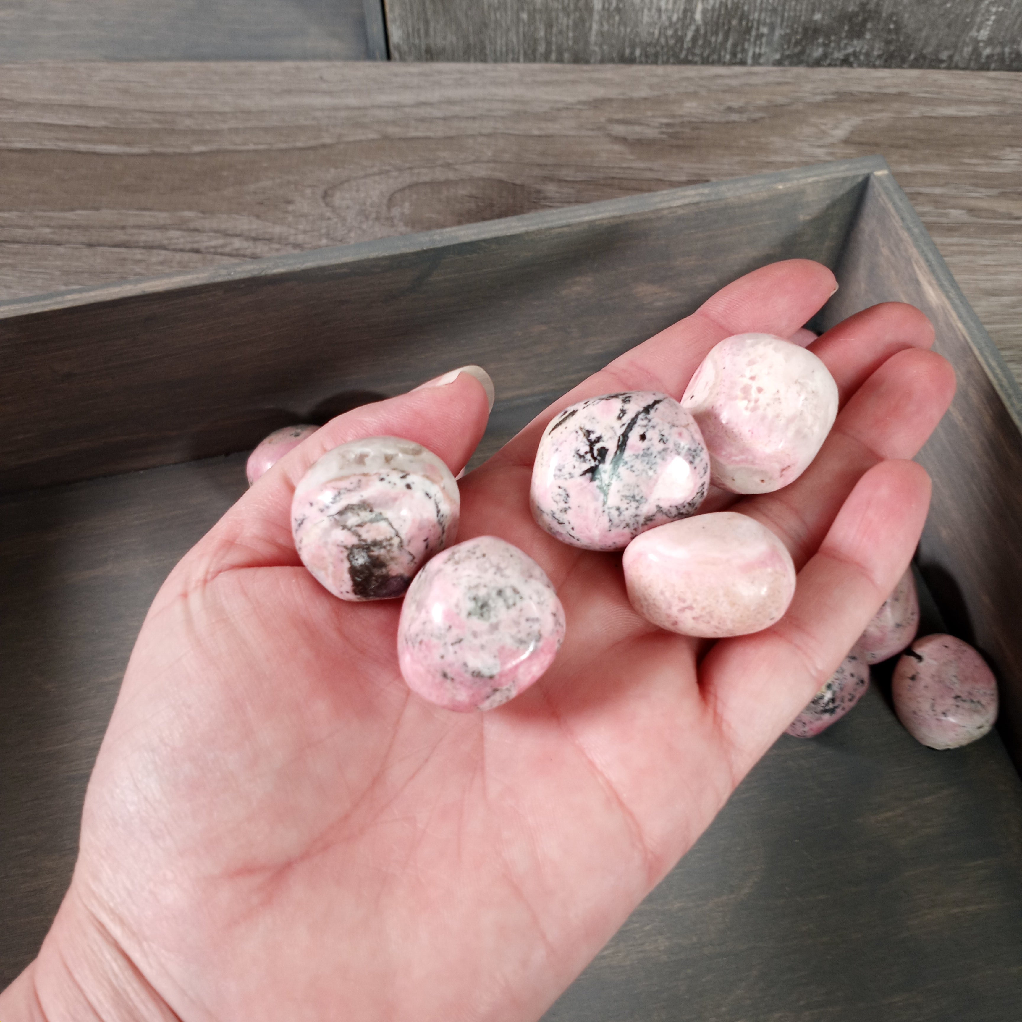 Large tumbled rhodonite.