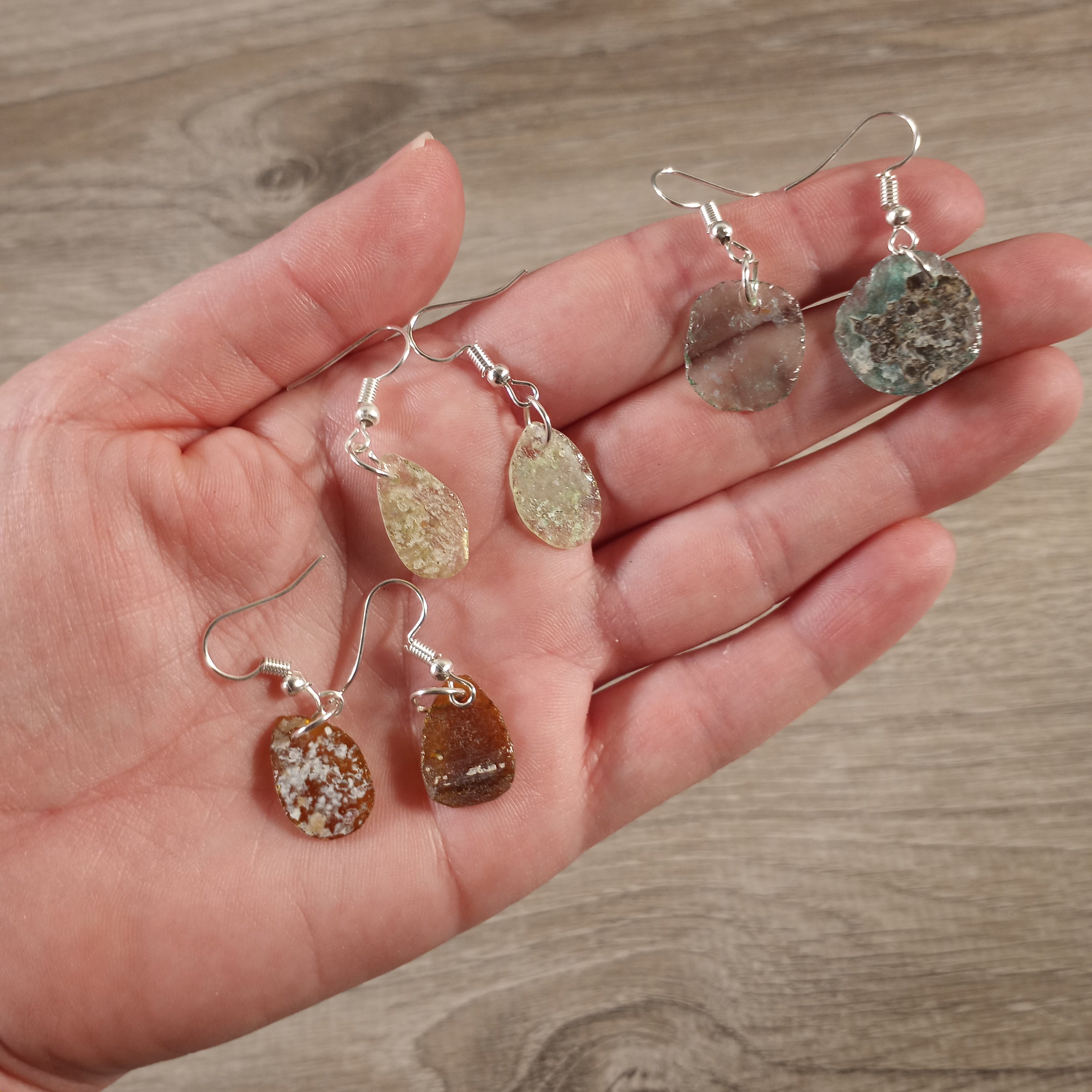 Handcrafted earrings featuring authentic ancient glass pieces in silver