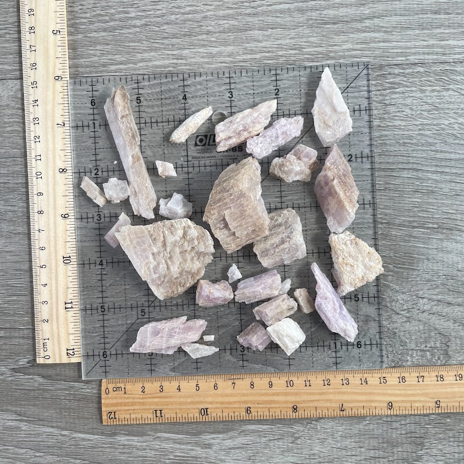 Wholesale raw kunzite crystals in a bag a half pound f natural rough gemstones
