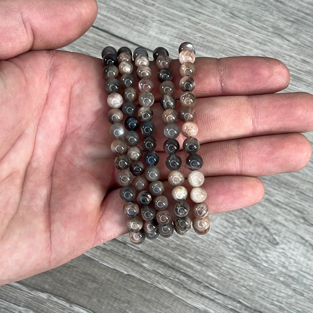 Stretchy bracelet made from 6mm round black moonstone beads