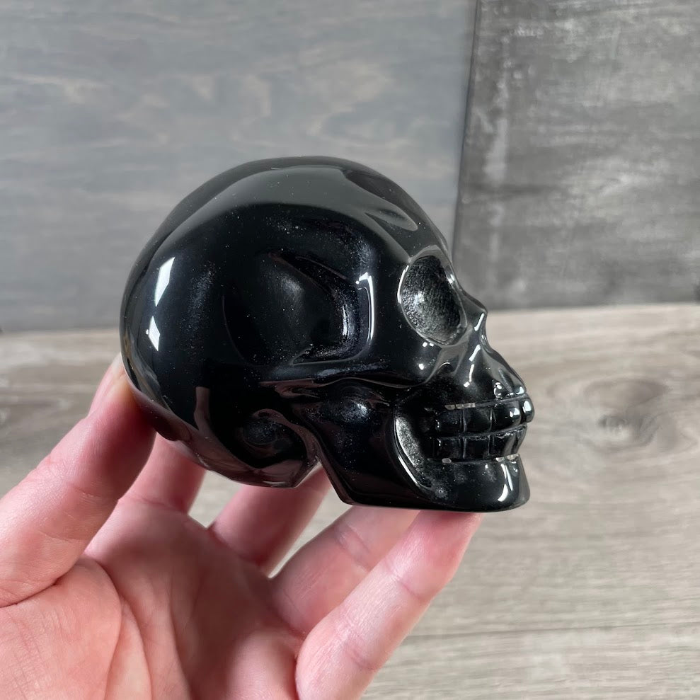 Large polished obsidian gemstone skull for metaphysical decor