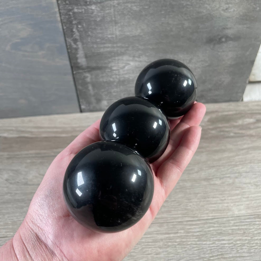 Wholesale Tri-Flo Obsidian sphere for gift shops