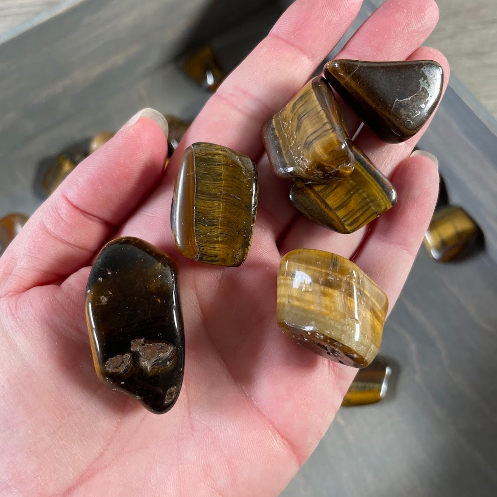 Natural Tiger Eye pocket stones with polished banded patterns