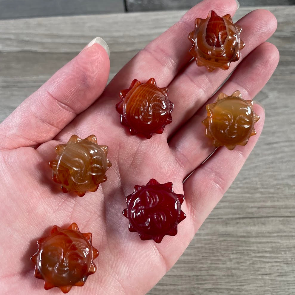 Carnelian carved sun face figurines perfect for gift shops impulse buyers