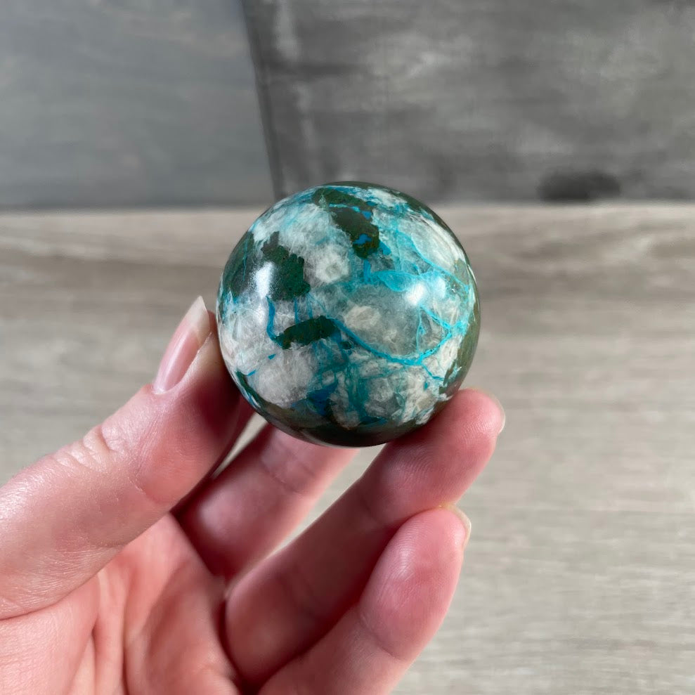 Blue green chrysocolla sphere for gemstone collectors and crystal displays