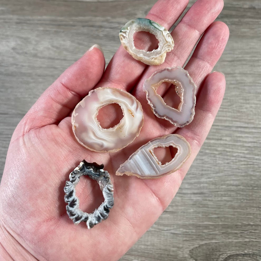 Natural Oco geode slices with druzy quartz centers and agate banding