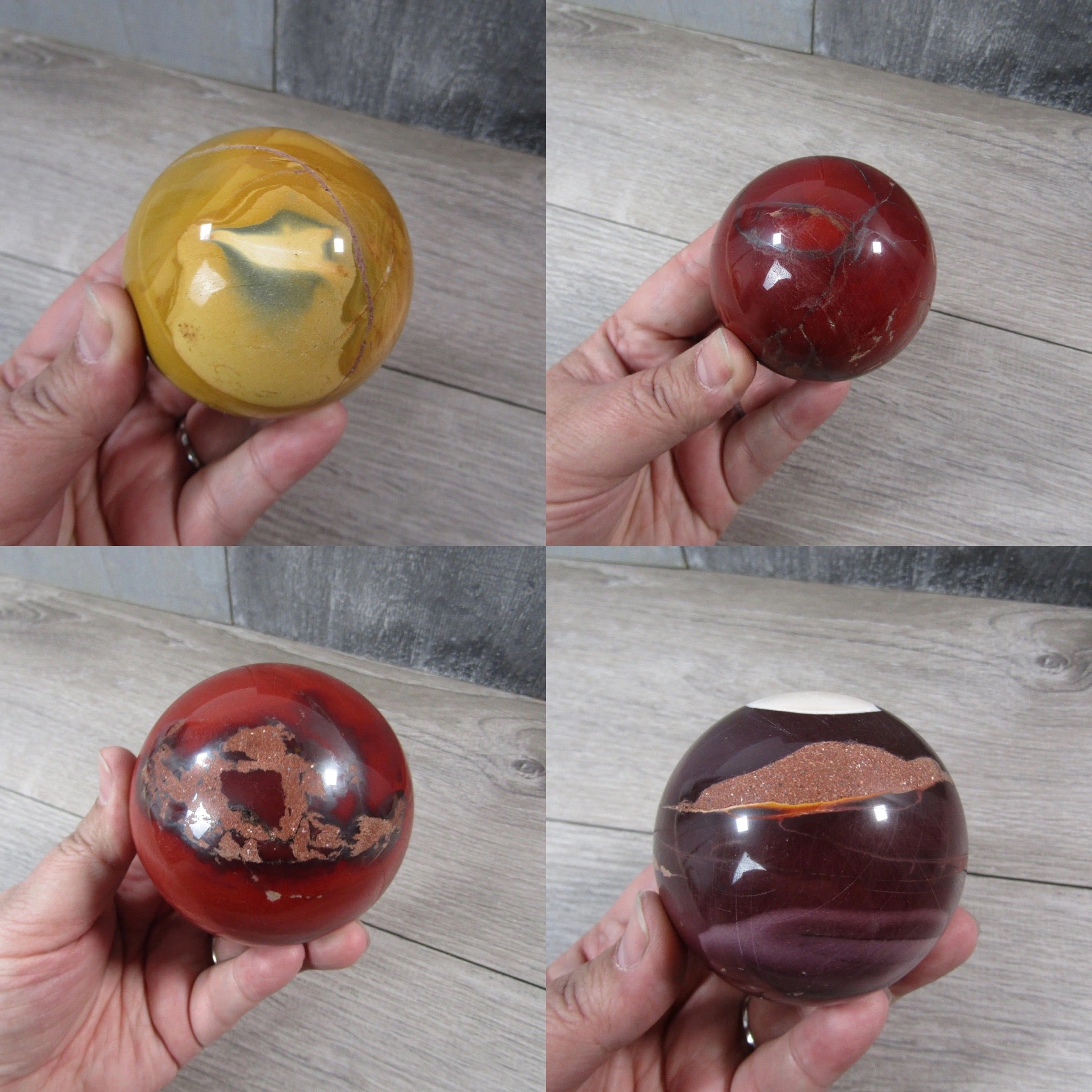 Mookaite Jasper spheres held by hands 