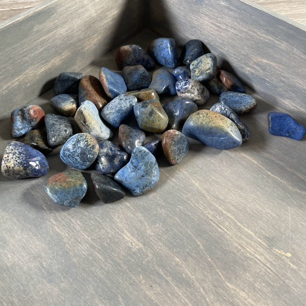 One pound lot of blue Dumortierite gemstone tumbles for resale
