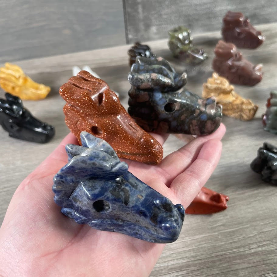 Assorted gemstone dragon skull figurines wholesale display