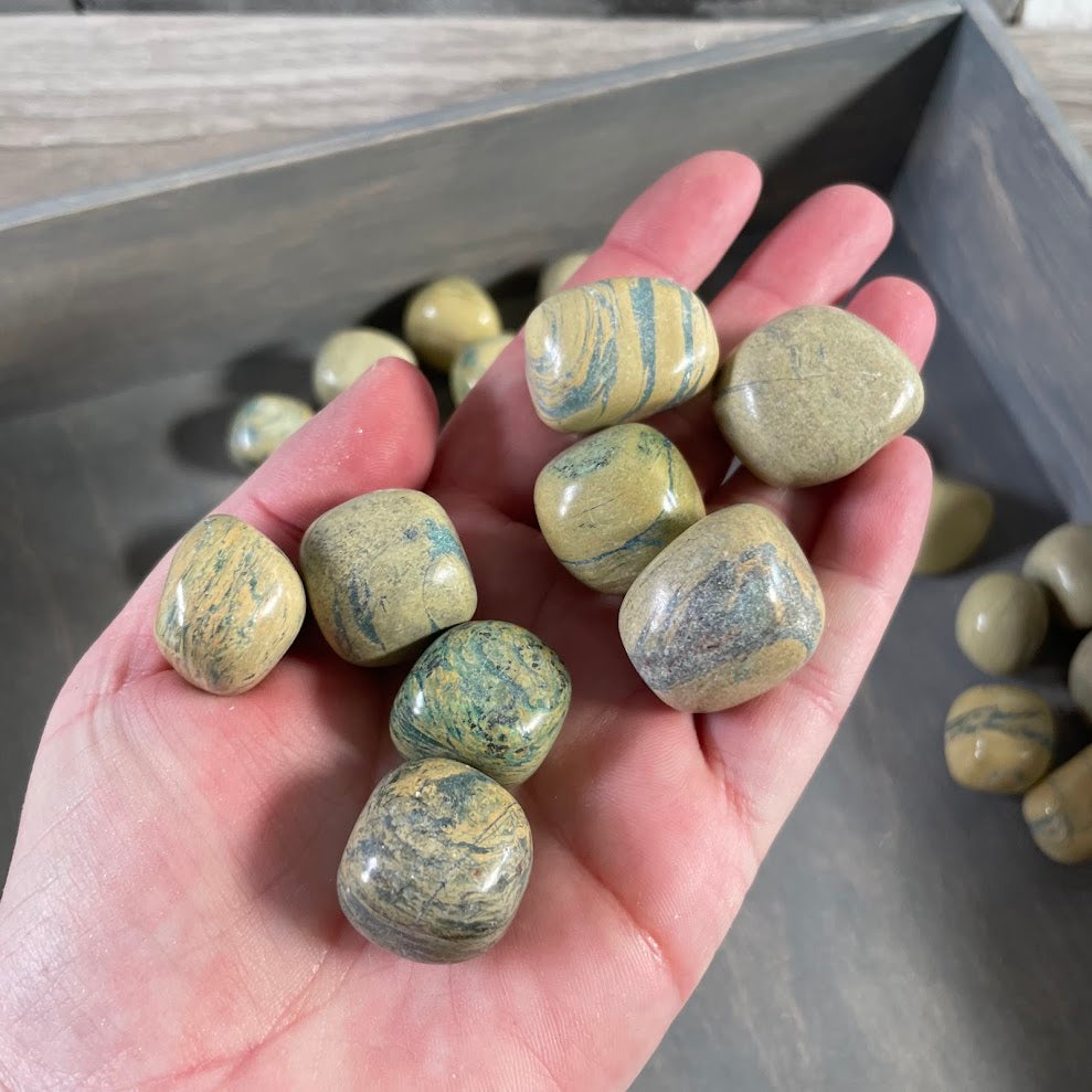 Polished jasper tumbled stones with assorted banding and earthy colors