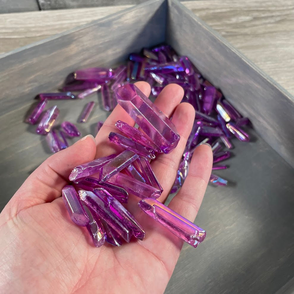 Rainbow metallic titanium aura crystal points close up