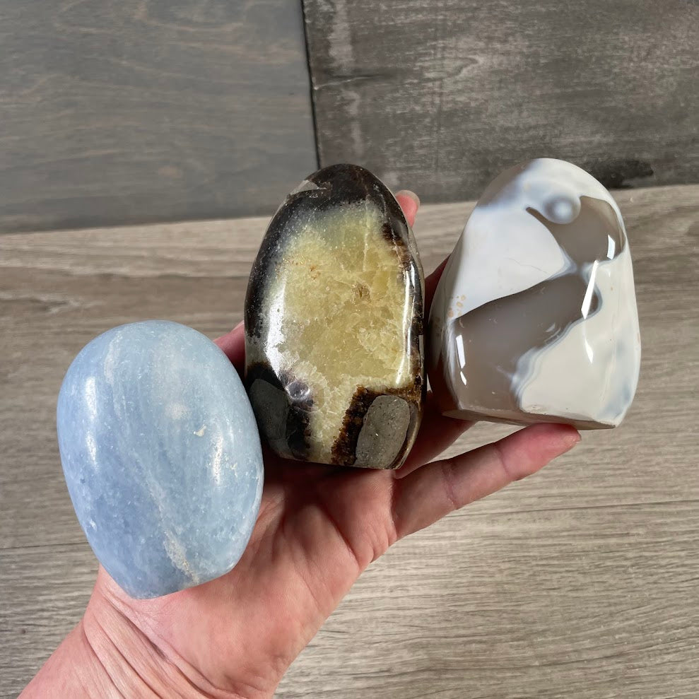 Assorted freeform crystals by the ounce with mixed polished gemstone pieces for wholesale resale