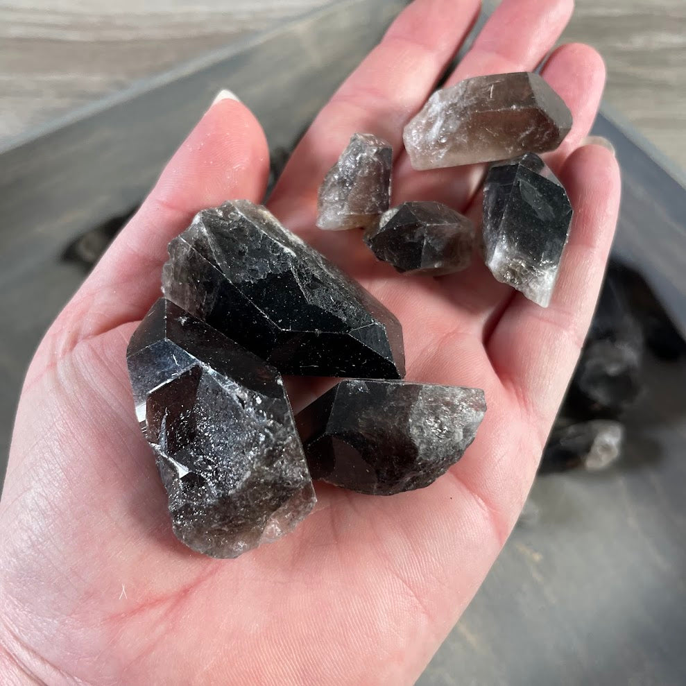 raw smoky quartz crystal points assortment sold by the 1 pound lot for rock shops