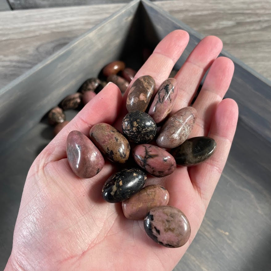 healing crystal rhodonite polished stones