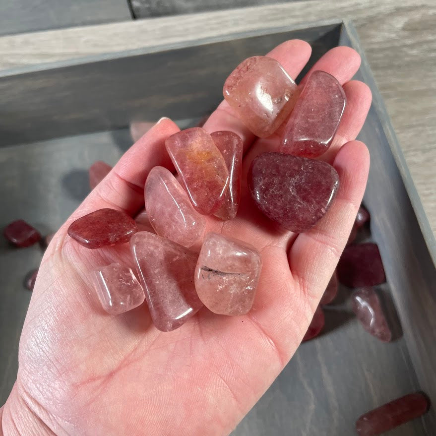 strawberry quartz healing crystals pink tumbled stones close up