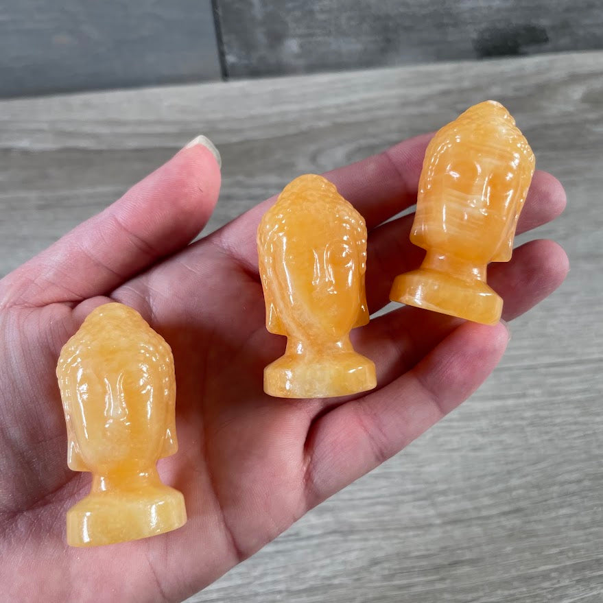 Orange Calcite medium carved Buddha head crystal figurine for spiritual décor