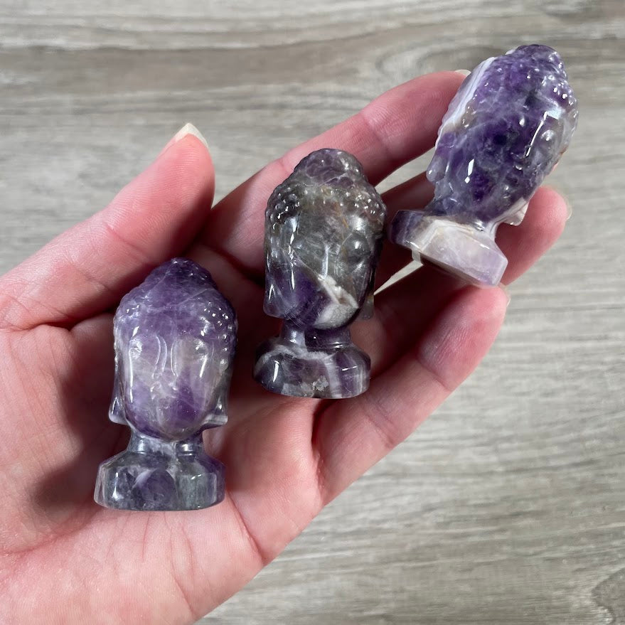 Amethyst carved crystal Buddha head statue for meditation spaces