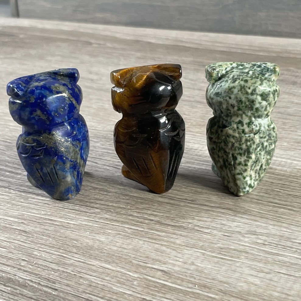 Back side of owl figurines