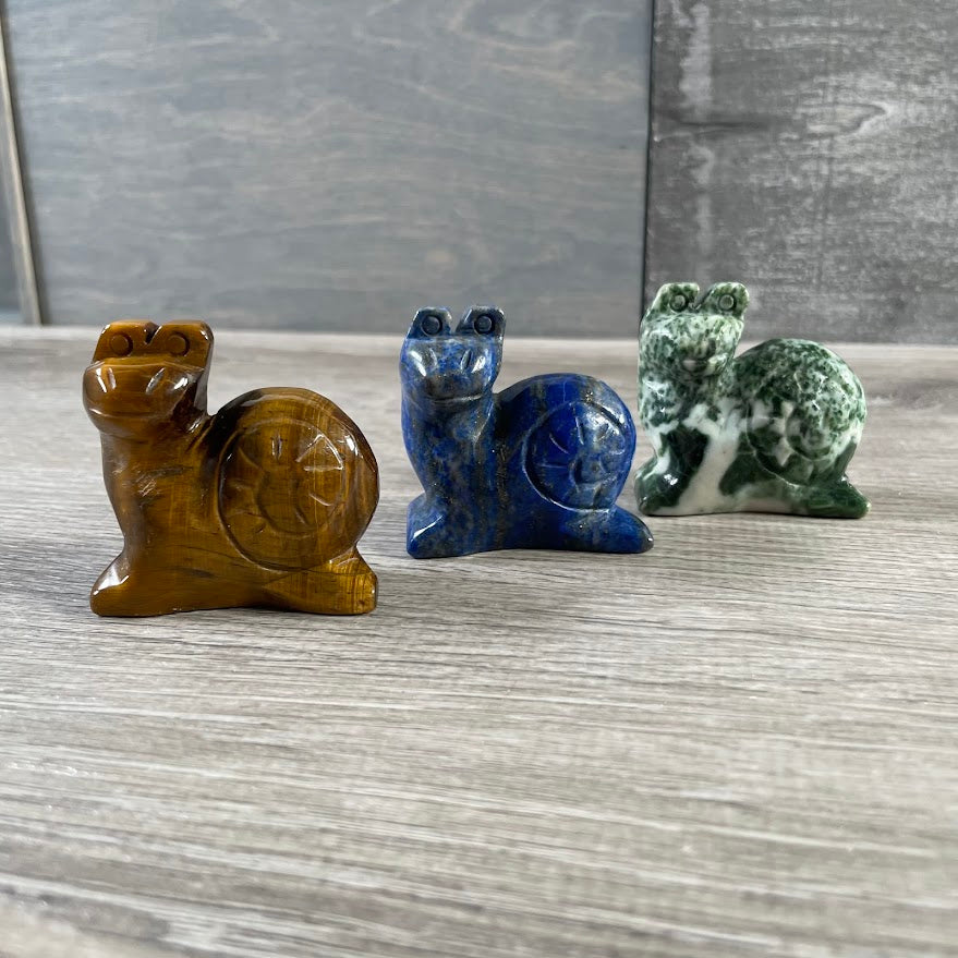Assorted gemstone nature-inspired gemstone snail carving for home decor