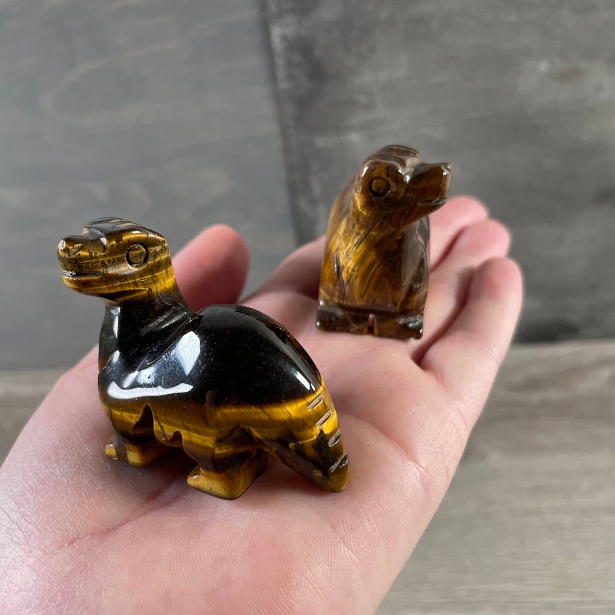Crystal dinosaur figurine shaped like a brachiosaurus for retail display