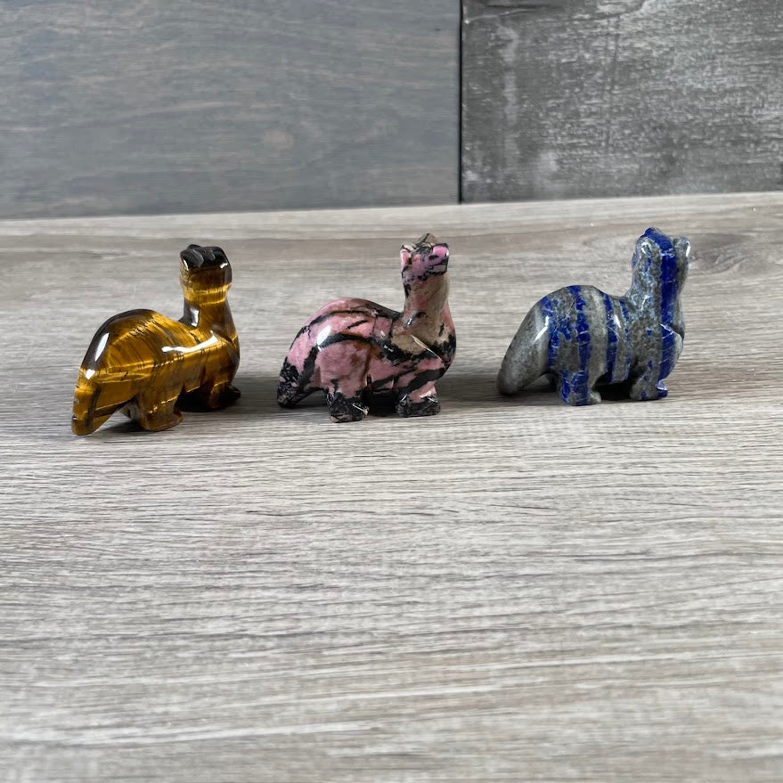 Gemstone animal figurine featuring a long-neck brachiosaurus dinosaur