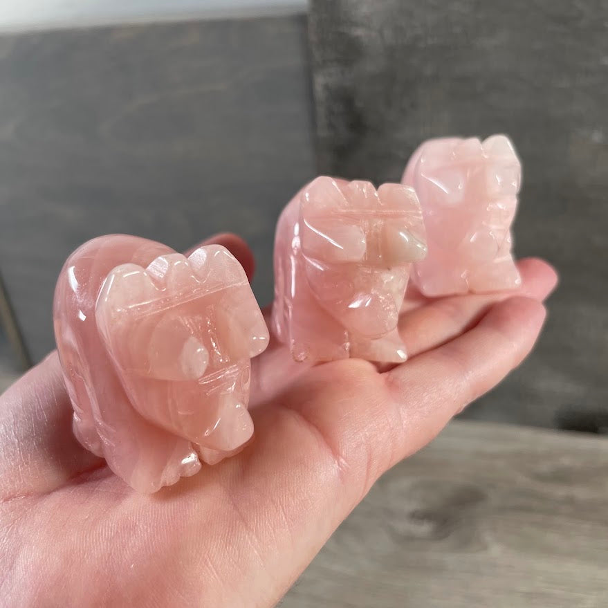 Rose Quartz gemstone dinosaur figurine with detailed triceratops design