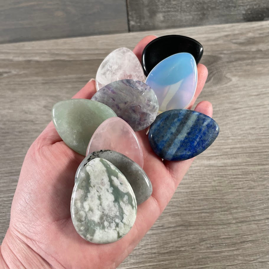 assorted teardrop shaped crystal worry stones bulk wholesale