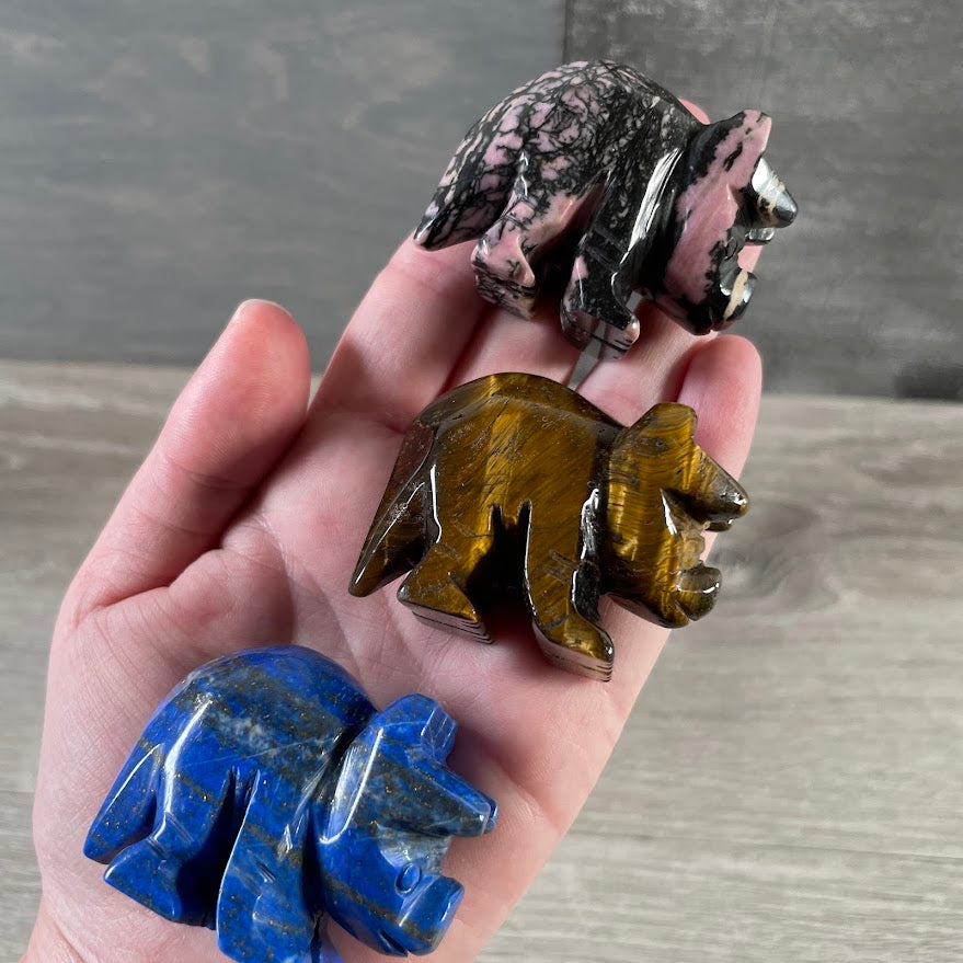 Medium triceratops crystal figurine carved from assorted gemstones