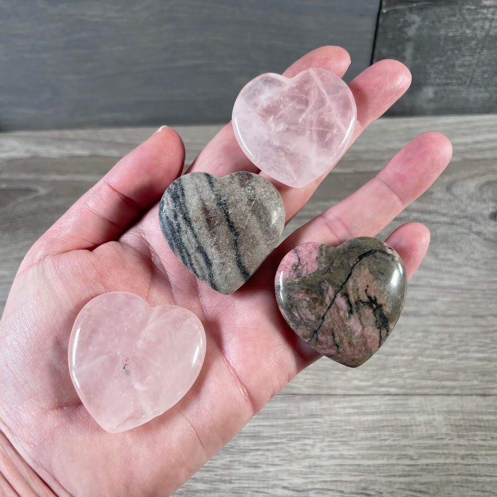 Assorted carved stone hearts for crystal collections
