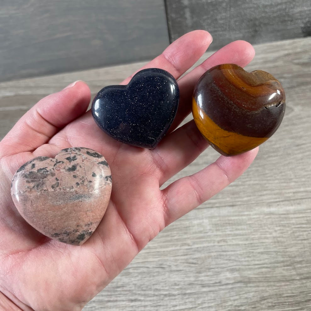 Polished heart shaped gemstones for spiritual gift displays