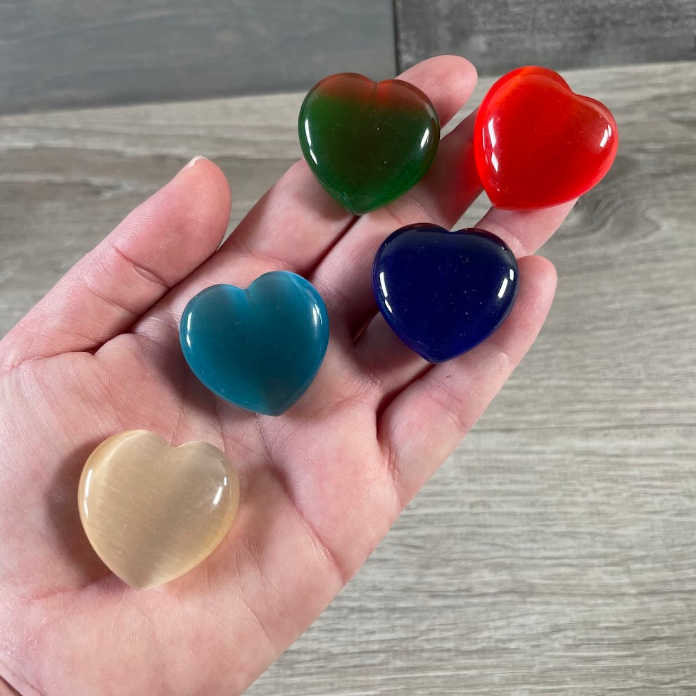 Assorted pocket-size heart stones for metaphysical and gift shops