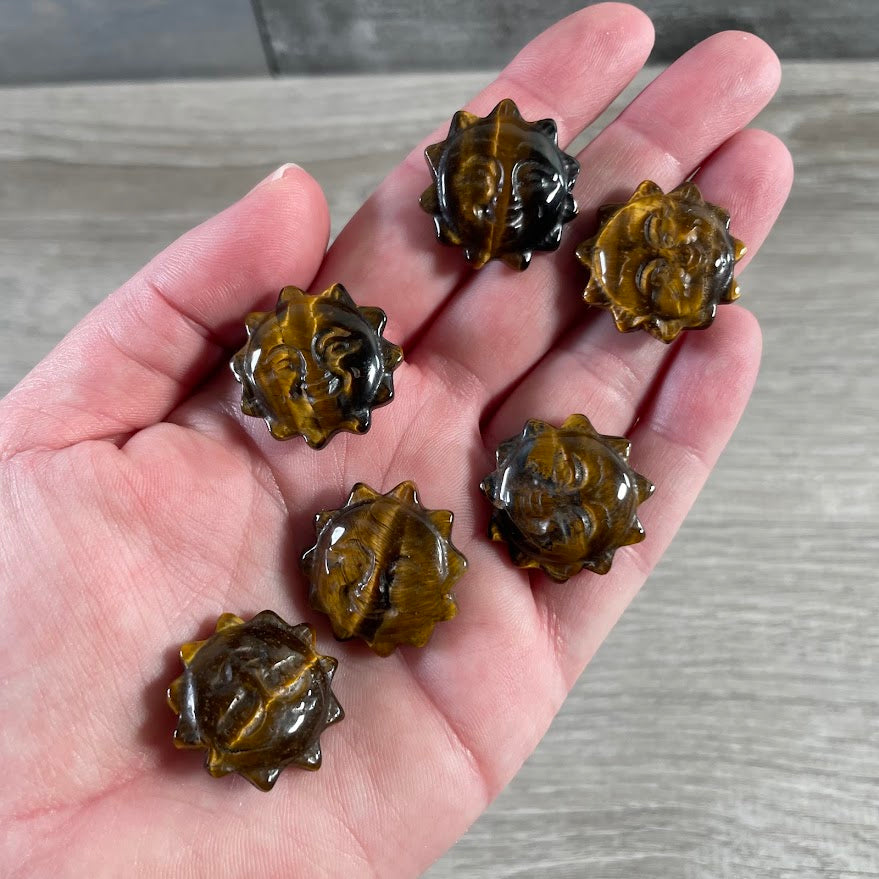 Tiger eye wholesale small crystal figurines with sun face carving