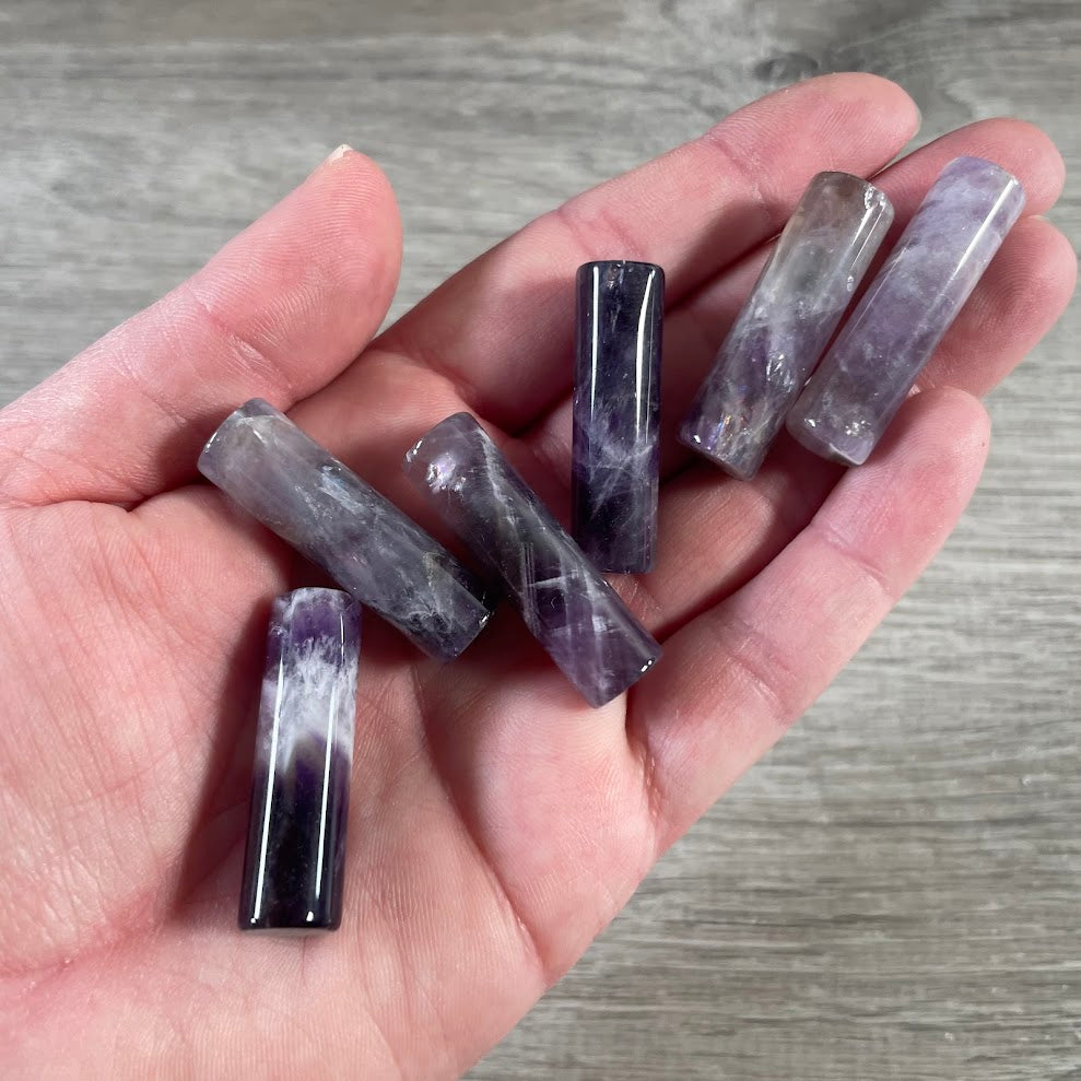 amethyst Crystal column tower with natural inclusions
