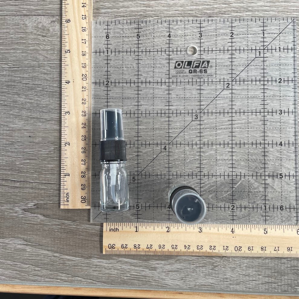 Small glass spray bottle for essential oils and room spray