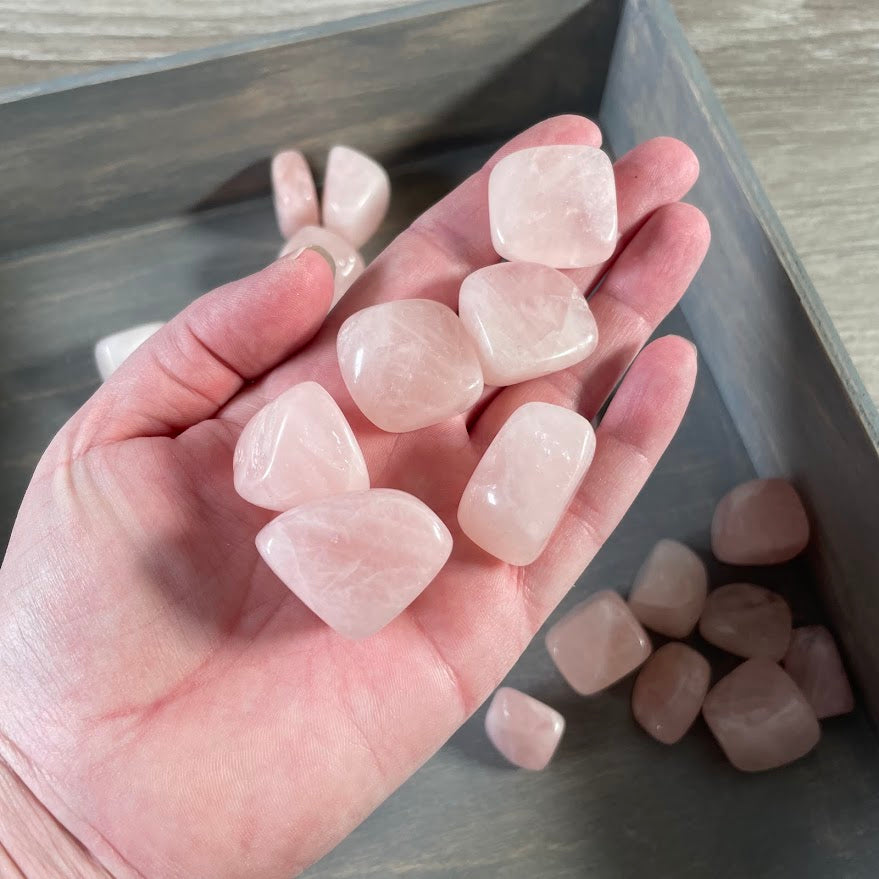 Natural rose quartz tumbled crystals for metaphysical shops and resale