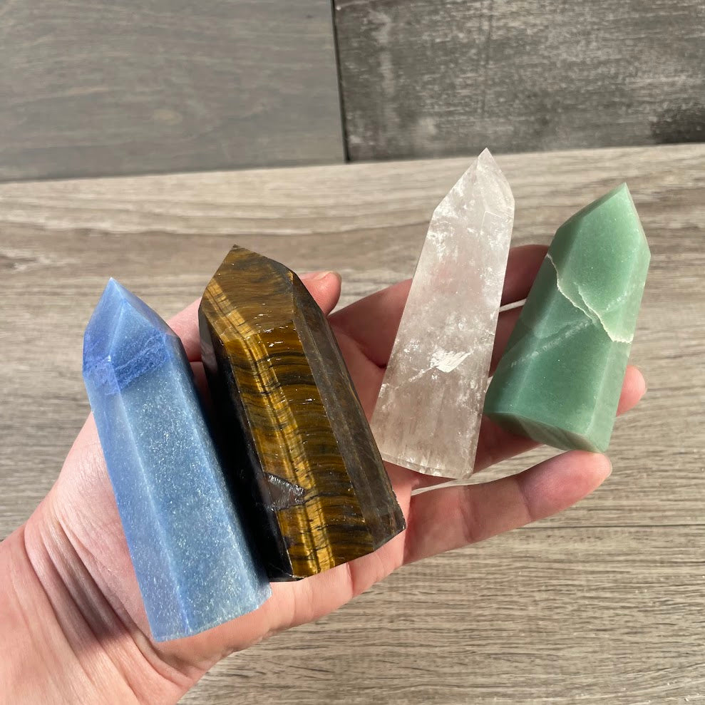 Assorted Brazilian gemstone obelisk towers sold by the ounce for wholesale crystal retailers