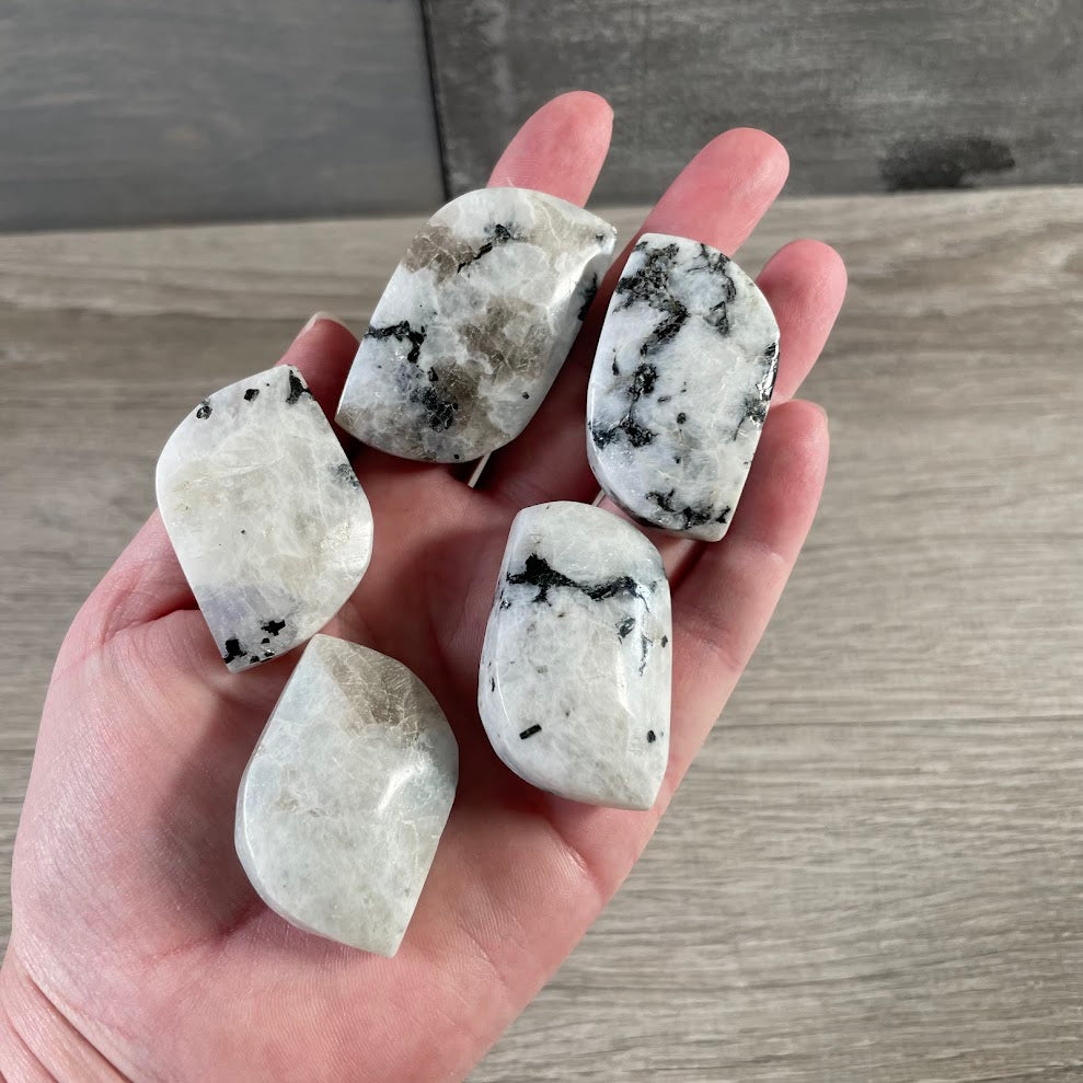 Polished Rainbow Moonstone Freeform gemstone with dark tourmaline patterns