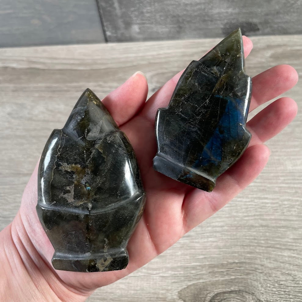 Natural labradorite fleur-de-lis stone carving with polished finish