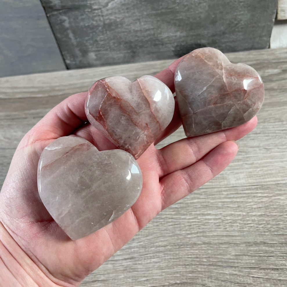 Polished hematite quartz heart for energy healing and meditation gift shop supply