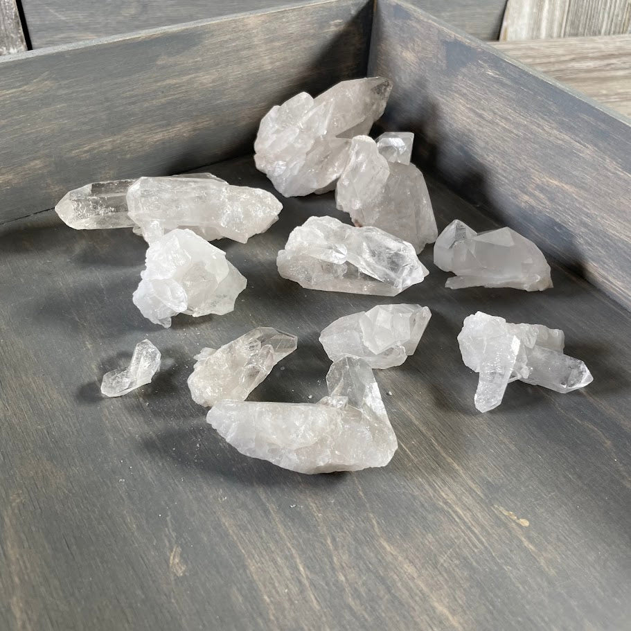 Wholesale clear quartz clusters and points for metaphysical shops.