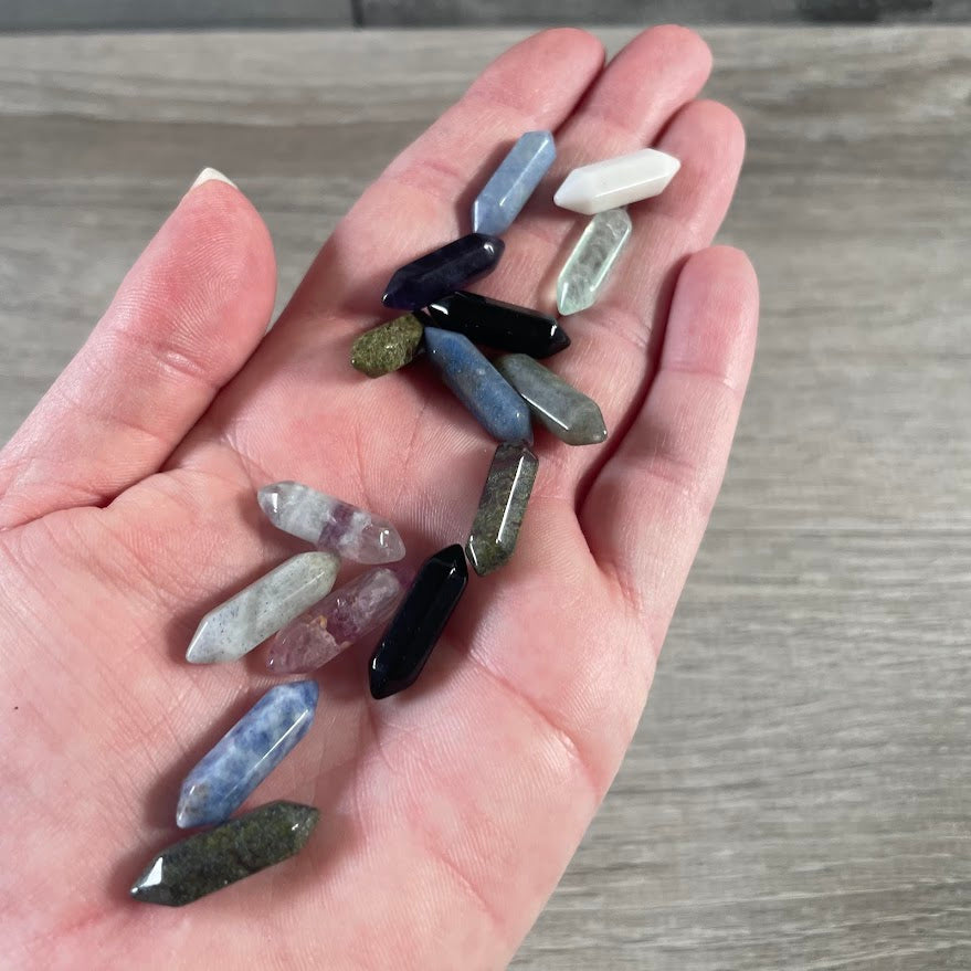 small assorted gemstone wands for spiritual shops
