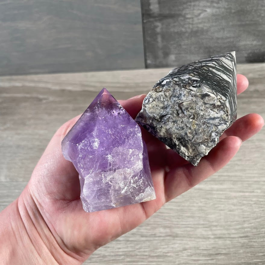 Raw edge crystal point with polished top and flat cut base rock shop supply