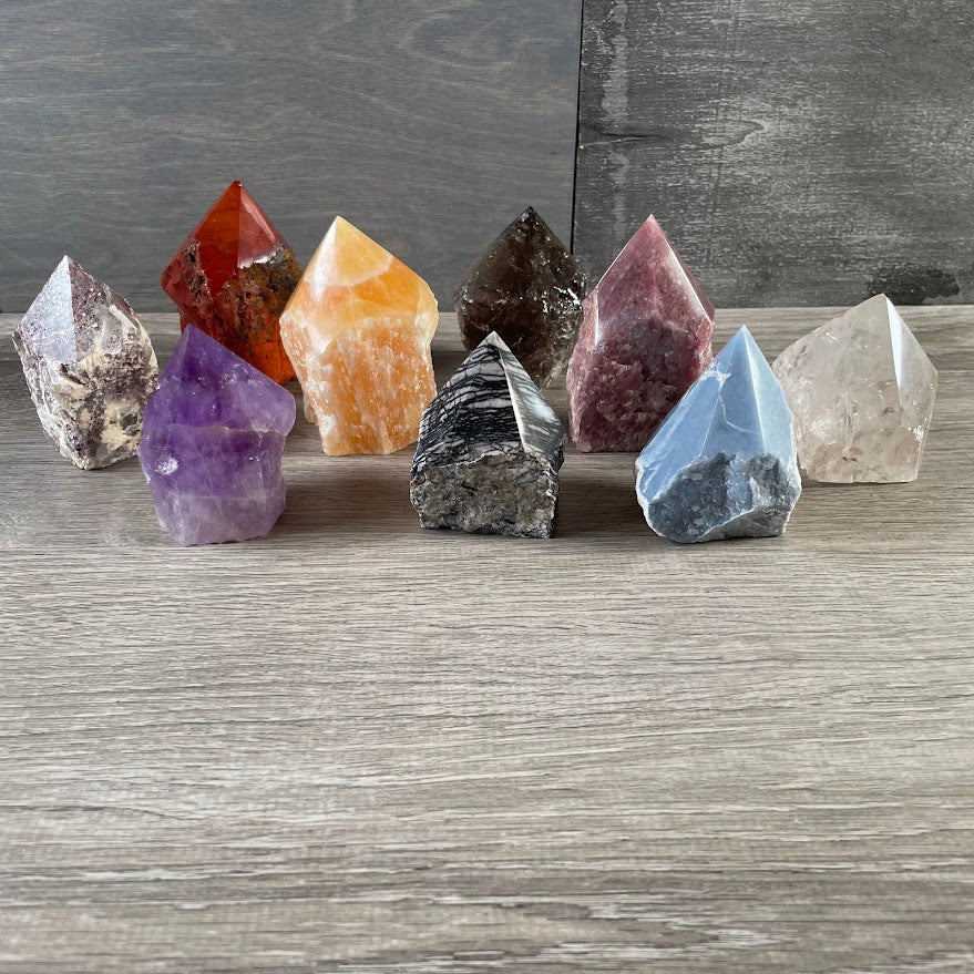 Natural crystal point with cut bottom for home decor and retail display