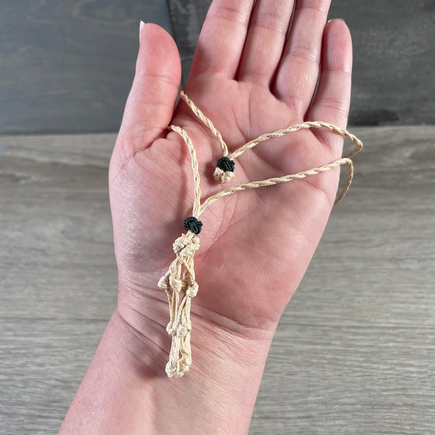 Beige crystal cage pouch necklace