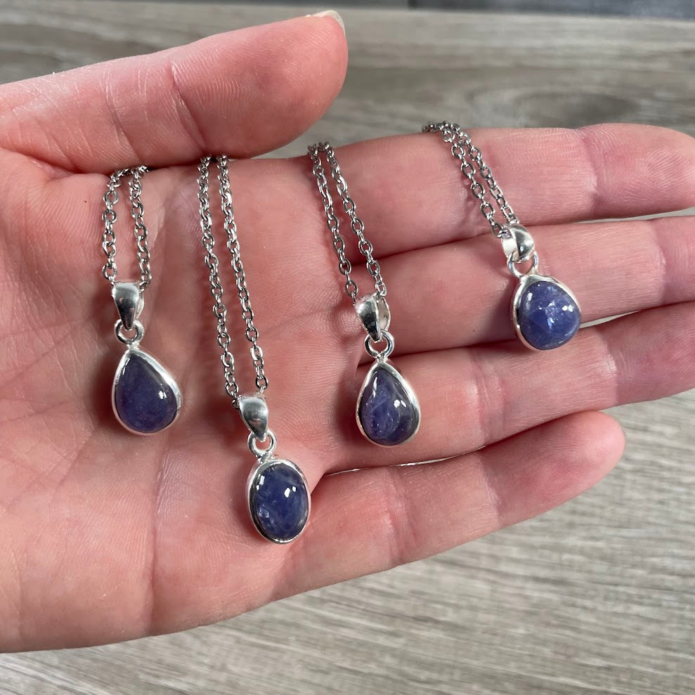 tanzanite sterling silver oval gemstone pendant with polished crystal with stainless steel chain