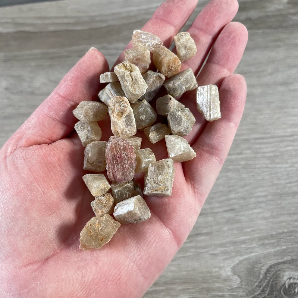Raw yellow apatite crystal chunks with natural golden color and texture