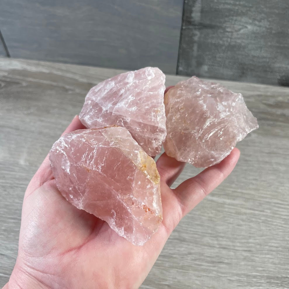 Raw rose quartz gemstones for altar supplies, Reiki, and spiritual décor